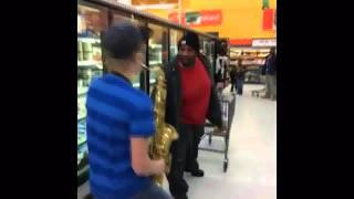 KID PLAYING SAXOPHONE FOLLOWING FAT DUDE IN SUPERMARKET revisited [upl. by Zielsdorf]