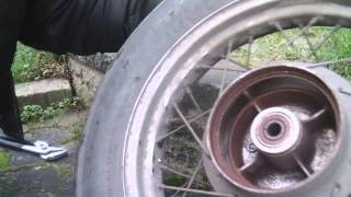 Fastest Motorcycle WheelBearing Removal EVER [upl. by Yendys]