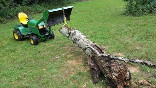 John Deere 445 and Little Buck Loader with Hooks and Log Tongs to Lift and Drag 425 455 XSeries [upl. by Ylecara373]