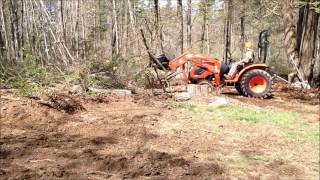 Kioti CK2610 Clearing Land and Moving wood [upl. by Hoeve]