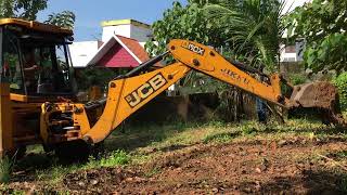 jcb 3dx cleaning land by removing grass [upl. by Ennazus226]