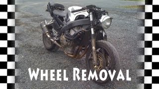 Part 1 Motorcycle Front Wheel Removal CBR600  Tire DIY How To [upl. by Aunson844]