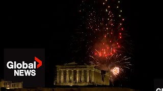 New Years 2024 Athens Acropolis illuminated by colourful fireworks display [upl. by Pattani]