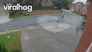 Pressure Washer Takes Girl For a Spin  ViralHog [upl. by Nilram625]