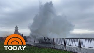 Rogue waves slam California beach knocking down onlookers [upl. by Veron199]