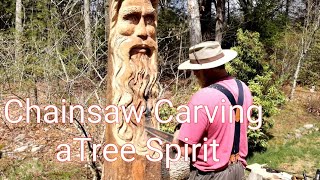 Chainsaw Carving a Tree spirit [upl. by Ahsener]