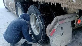 How to put tire chains on a semi truck [upl. by Karlik]