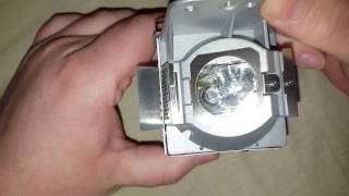 HOW TO REPLACE THE LAMP ON A BENQ W 1070 PROJECTOR [upl. by Moshe155]