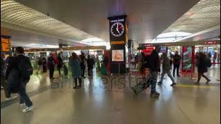 People departing and arriving at terminal of Termini train station Rome in Italy Static view [upl. by Gisele204]