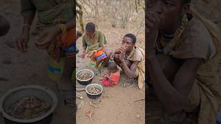 Hadza Family Enjoy Guinea Fowls Meat For Breakfastshortsfeed hadzabetribe [upl. by Namsaj]