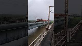 Locomotive captured while crossing Bhayandar khadi 🚅🎥 train railover expresstrain indianrailways [upl. by Irbua]