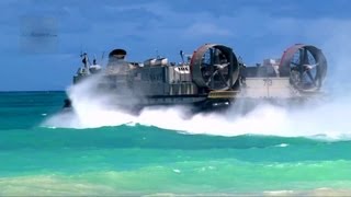 US Navy LCAC Hovercraft Land on Beach Unload Equipment Return to Aircraft Carrier [upl. by Aynor]