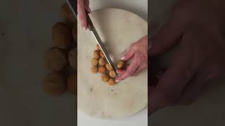 How to Slow roast macadamia nuts food shorts howto [upl. by Weywadt]