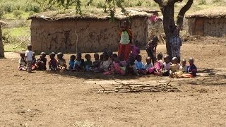 quotMasai Villagequot known as a quotManyattaquot Masai Mara KENYA [upl. by Mafalda]