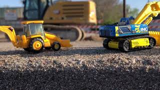 Construction toys  Hot wheels Matchbox and NORSCOT CAT 966G Wheel Loader at construction site￼ [upl. by Ainer]