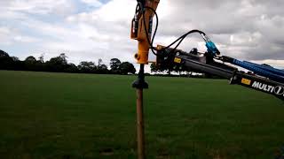 Hydraulic post knocker  driver on MultiOne loader [upl. by Berlin]