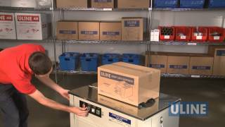 Uline H2079 SemiAutomatic Poly Strapping Machine  Demonstration [upl. by Aliak]