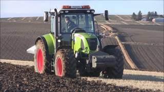 Claas Arion 640 tractor with Ovlac 5 furrow reversible plough  Grampian Supermatch [upl. by Nylakcaj]