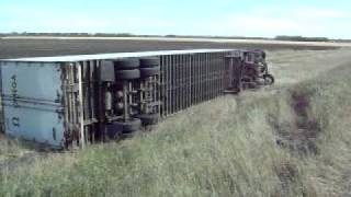 High Wind blows Semi Tractor Trailer off of the HighwayMOV [upl. by Anoniw]