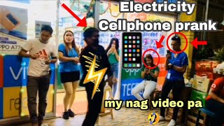 Electricity Cellphone PrankPublic Prank Takie Takie [upl. by Ynohtnanhoj761]