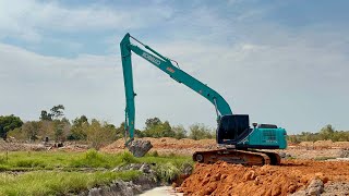 KOBELCO SK210LC10 LR 16เมตร กำลังขุดดินกระทิออกจากพื้นที่สร้างโรงแป้ง [upl. by Ramor515]