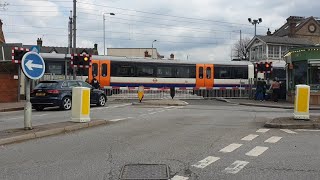 London Overground Class 710s passing Highams Park level Crossing Greater London [upl. by Flem]