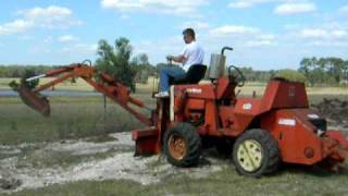 DitchWitch using backhoe [upl. by Ayokal]