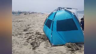 WolfWise 4 Person Easy Up Beach Tent UPF 50 Portable Instant Sun Shelter Canopy revieww [upl. by Harri]