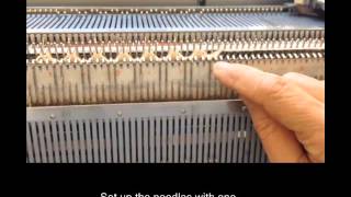 Knitting 2x2 rib on a double bed knitting machine with a ribber [upl. by Tisbee]