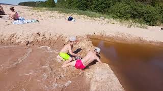 Breaking a DIY sand dam on a small Baltic see river [upl. by Einnod]