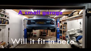 Installing a 2 post car lift in a small garage part1 [upl. by Dacey671]