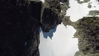 Slackliner enjoys summer highlining between mountain peaks in Whistler Canada [upl. by Strade491]