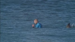 Surfer Fights Off Shark During Competition [upl. by Gant]