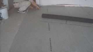 Installing Flooring Underlayment Over Concrete Subfloor For Floor Installation Mryoucandoityourself [upl. by Nnodnarb]